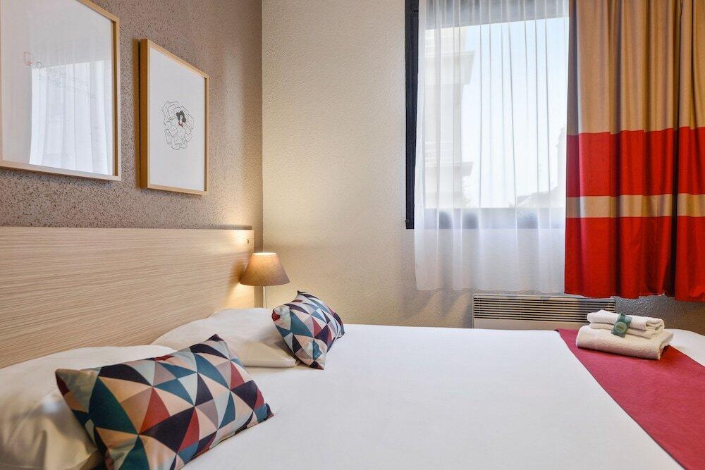 Foto de una habitación de Appart&amp;#039;City Classic Nantes Viarme