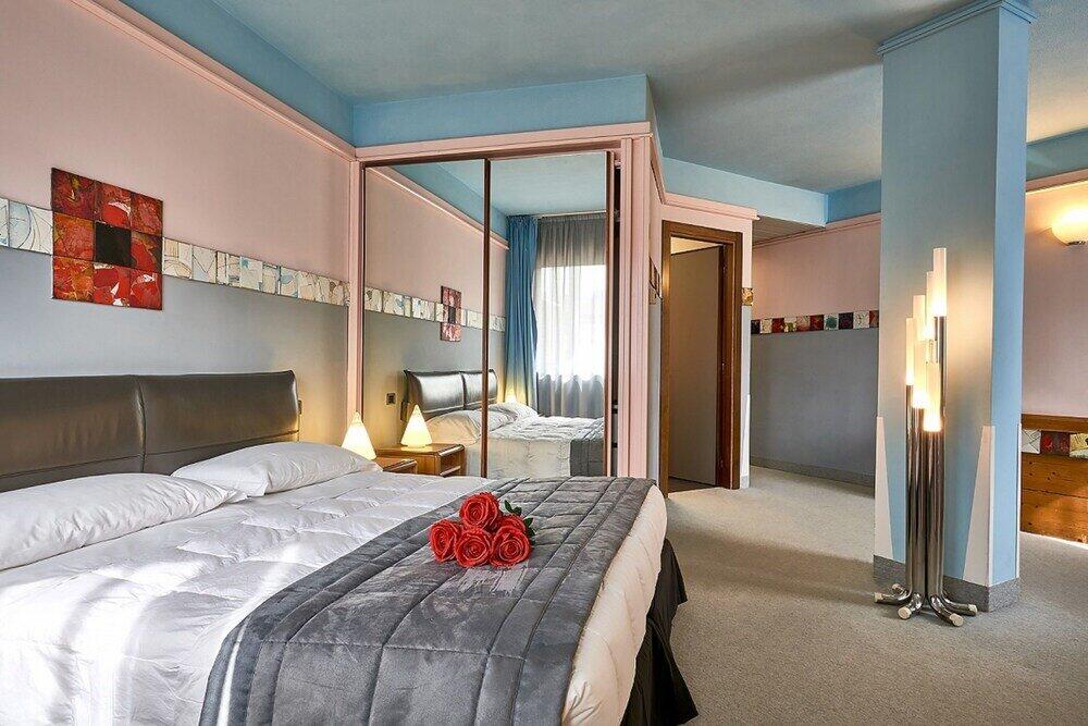 Foto de una habitación de Albornoz Palace Hotel