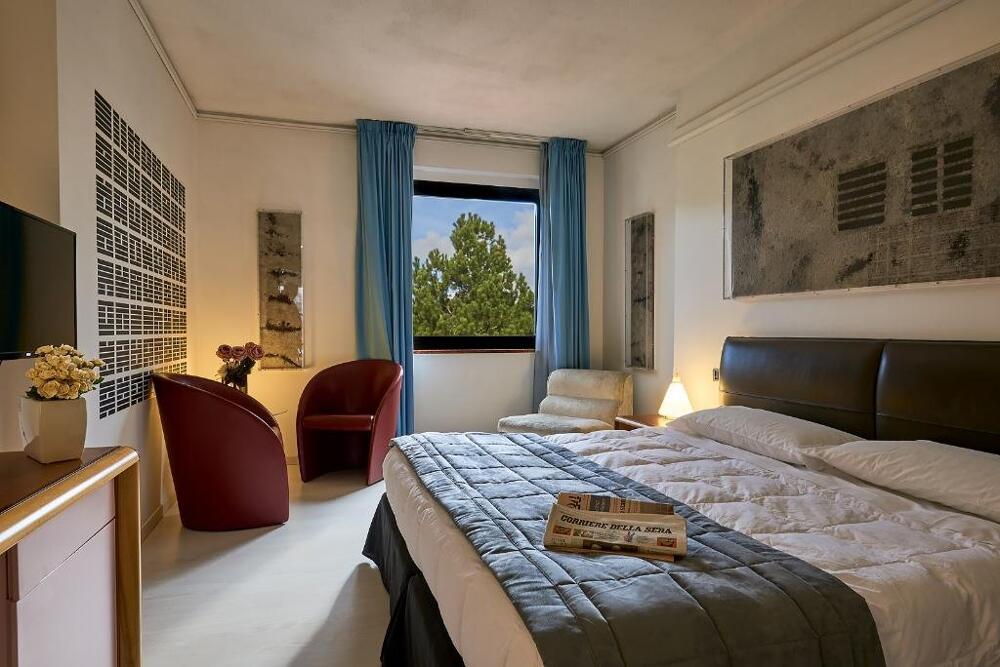 Foto de una habitación de Albornoz Palace Hotel
