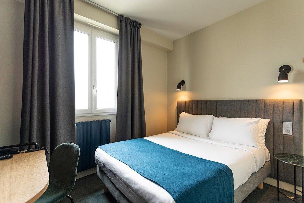Foto de una habitación de Grand Hotel de la Gare