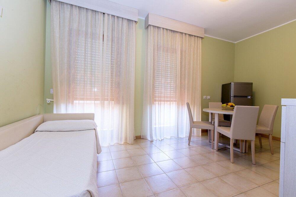 Foto de una habitación de Hotel Residence Ulivi E Palme