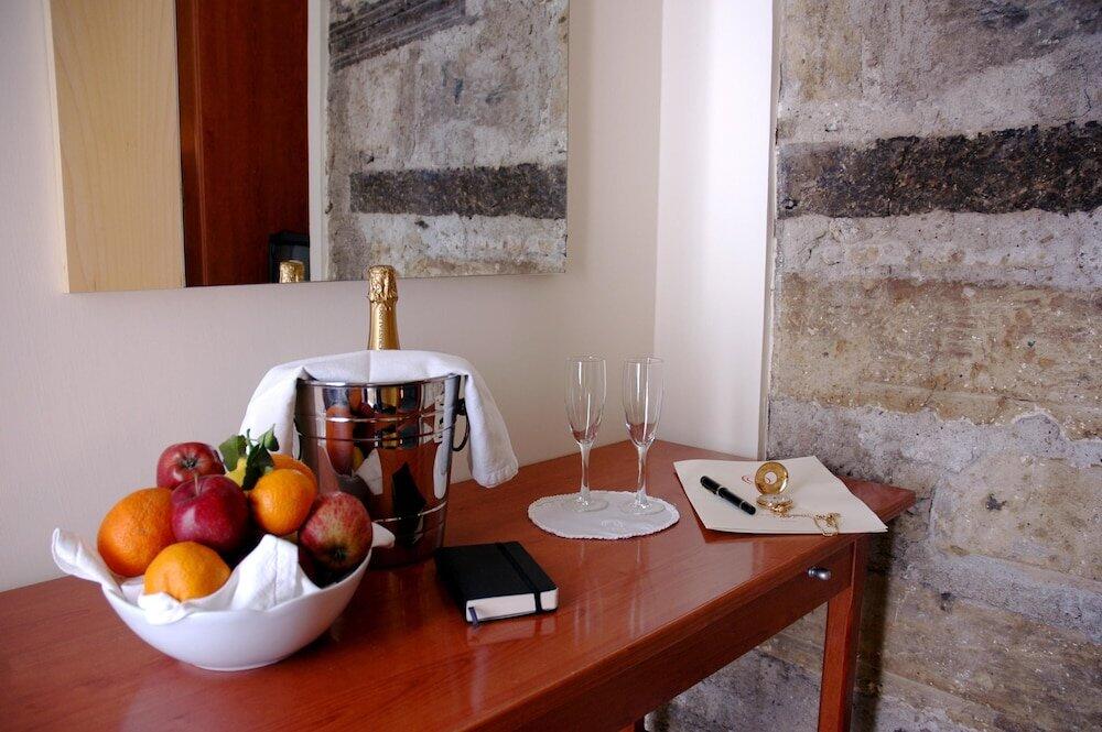 Foto de restauración de Caravaggio Hotel