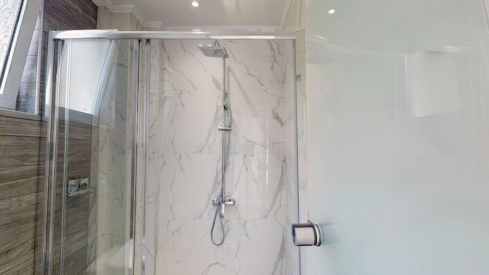 Foto del baño de Porto Kalamaki Hotel