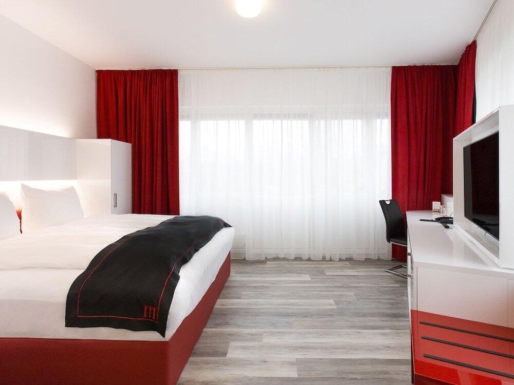 Foto de una habitación de DORMERO Hotel Hannover-Langenhagen Airport