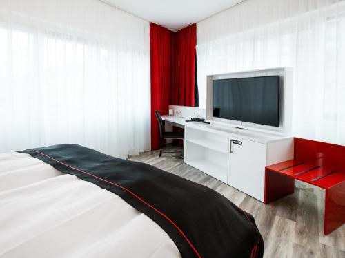 Foto de una habitación de DORMERO Hotel Hannover-Langenhagen Airport