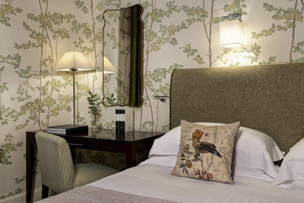 Foto de una habitación de Rocco Forte Hotel Savoy