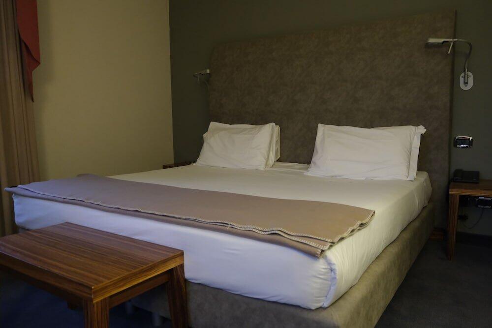 Foto de una habitación de Settecento Hotel