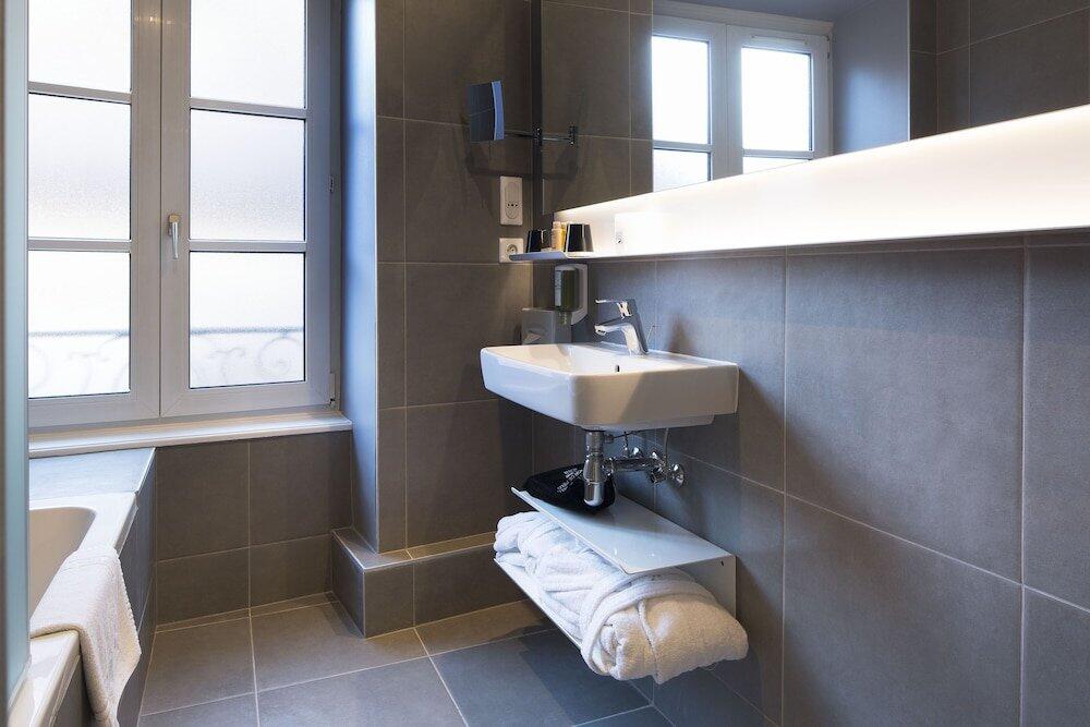 Foto del baño de Hôtel Gutenberg