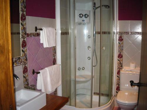 Foto del baño de Hotel La Pradera