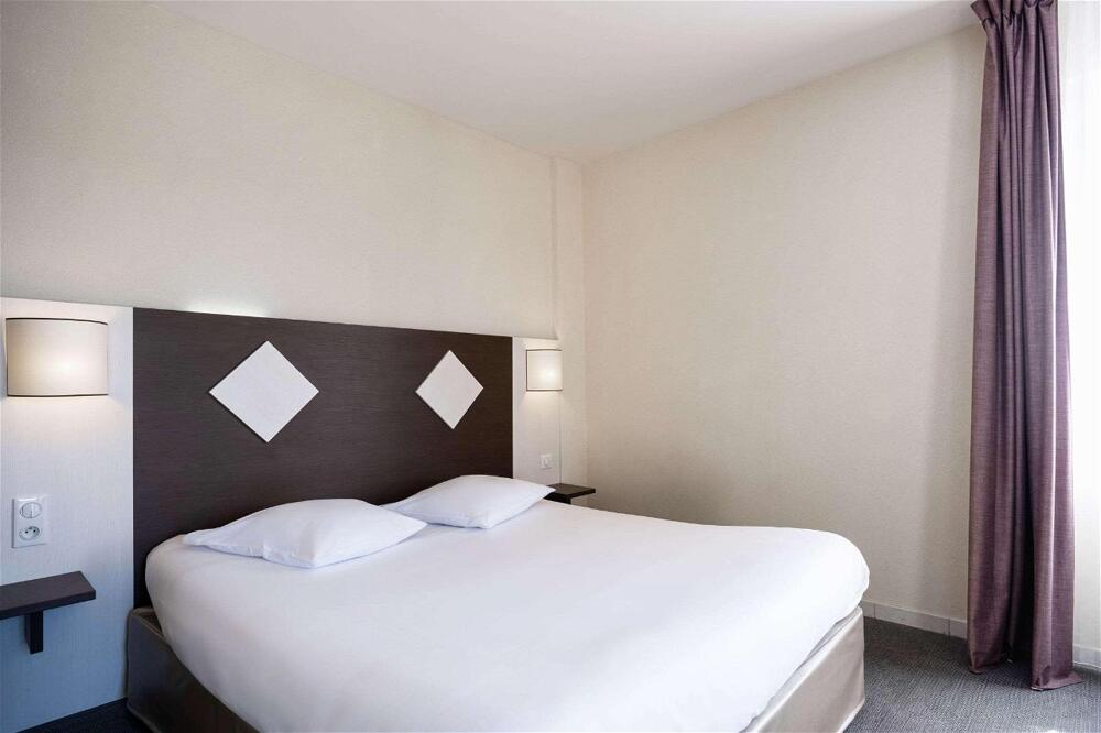 Foto de una habitación de Comfort Hotel Saintes