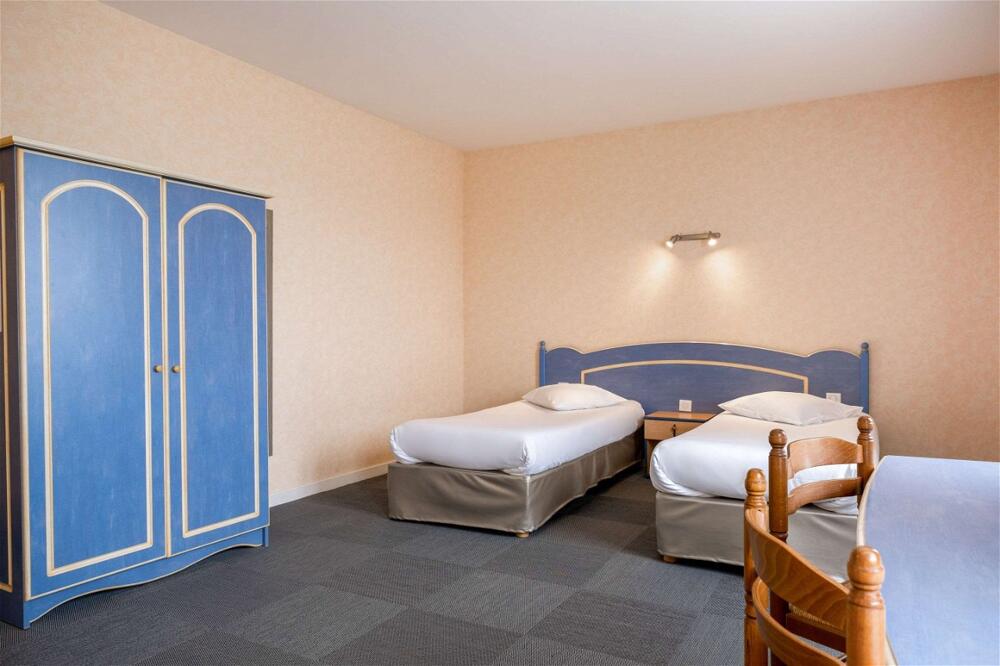 Foto de una habitación de Comfort Hotel Saintes