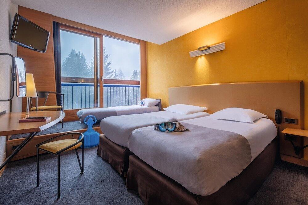 Foto de una habitación de Belambra Clubs Arc 1800 - Hôtel Du Golf
