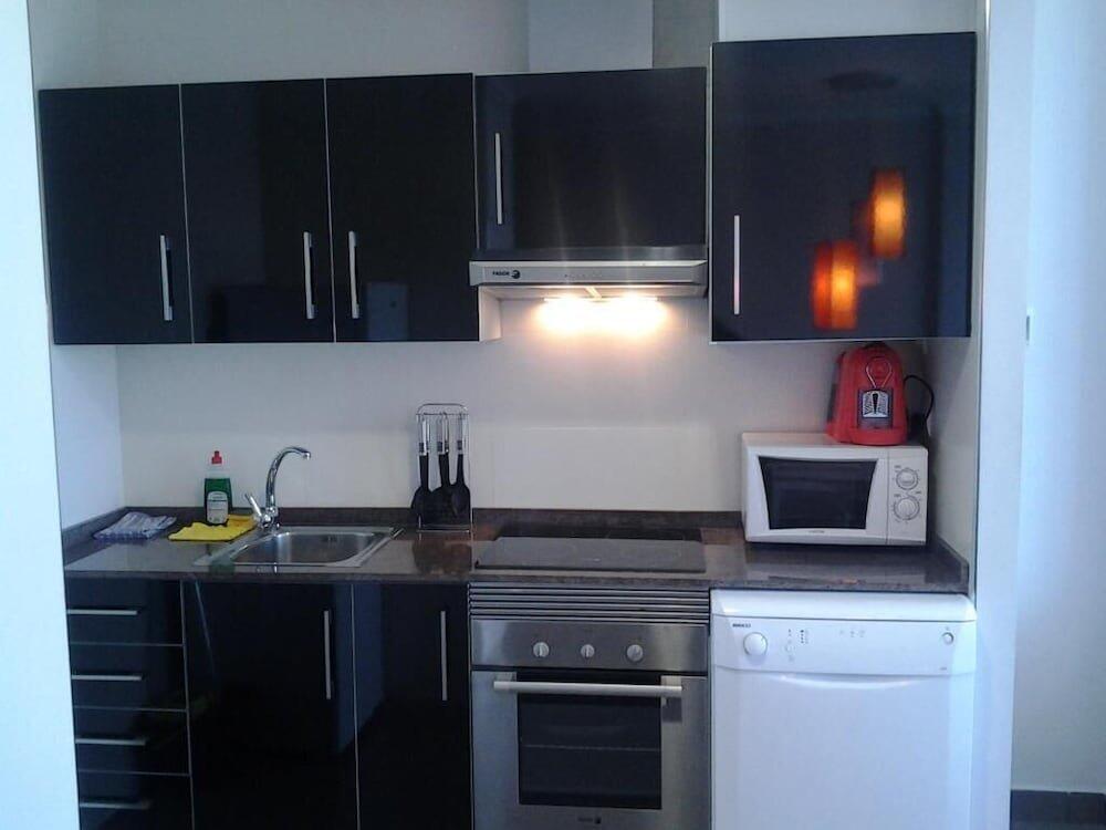 Foto de una habitación de Aparthotel El Faro