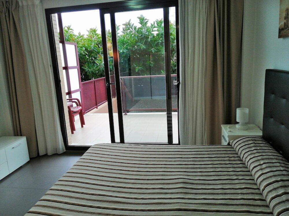 Foto de una habitación de Aparthotel El Faro