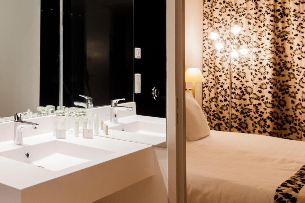 Foto del baño de Hotel C Suites