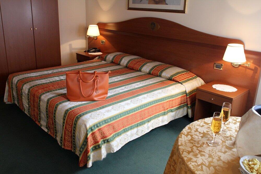 Foto de una habitación de Hotel Antico Moro