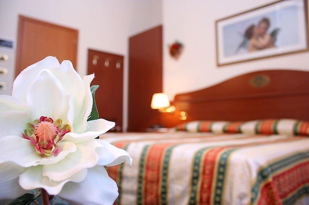 Foto de una habitación de Hotel Antico Moro