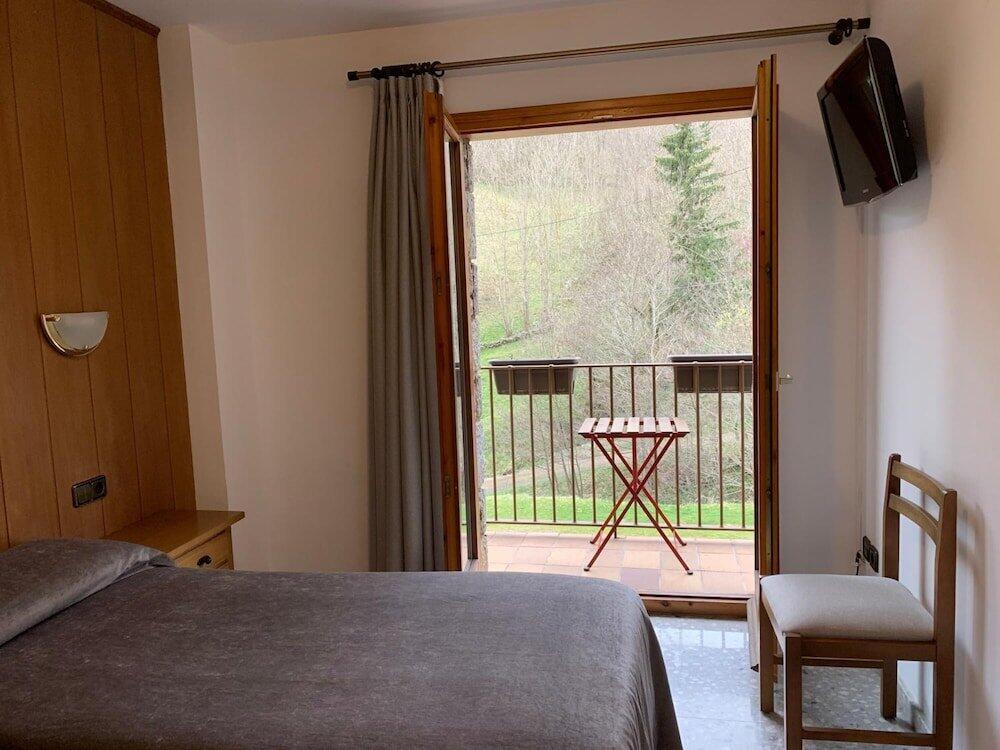 Foto de una habitación de Hostal El Quintà