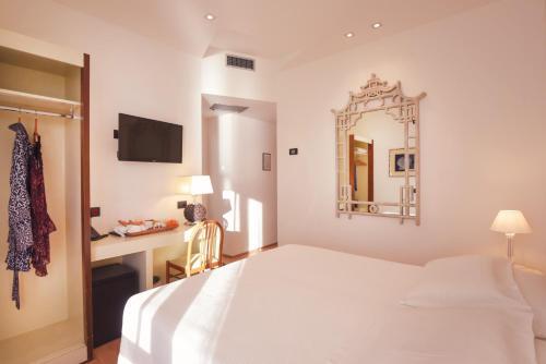 Foto de una habitación de Hotel Florida Lerici