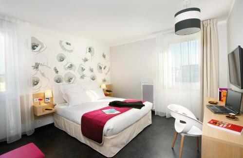 Foto de una habitación de Appart&amp;#039;City Classic Reims Parc des Expositions