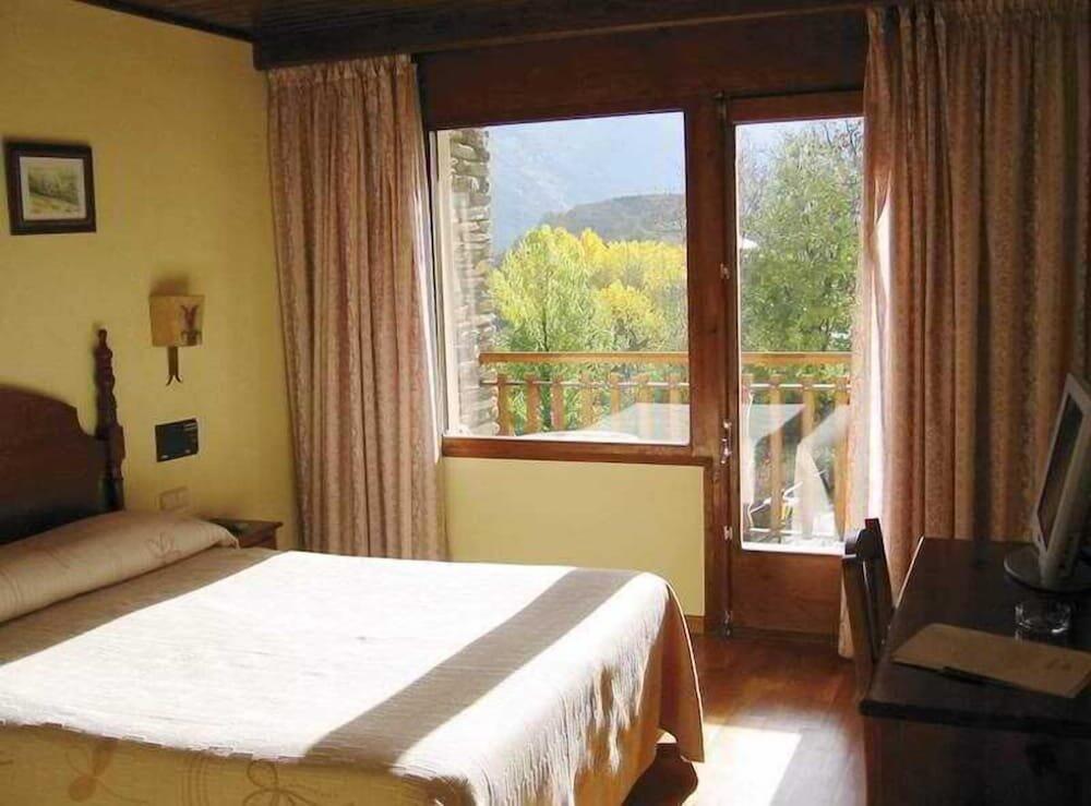 Foto de una habitación de Hotel La Morera