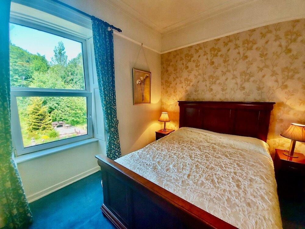 Foto de una habitación de Hostal Belvedere Lodge