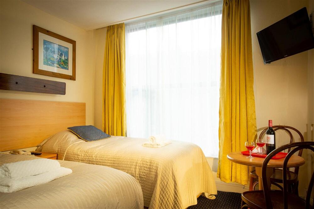 Foto del baño de Ashley Hotel