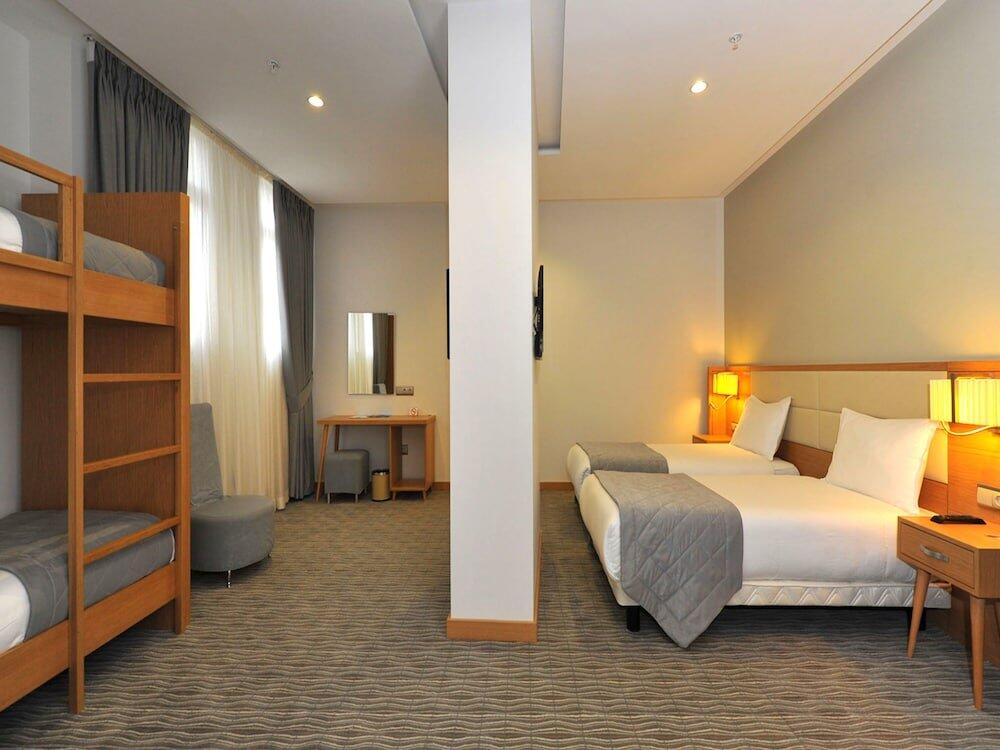 Foto de una habitación de Hotel Olimpiyat