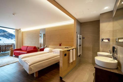 Foto del baño de Hotel Alpen Resort Bivio