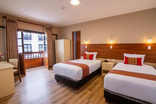 Foto de una habitación de Hotel San Pedro Plaza