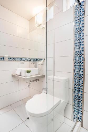 Foto del baño de Natura Inn Hotel