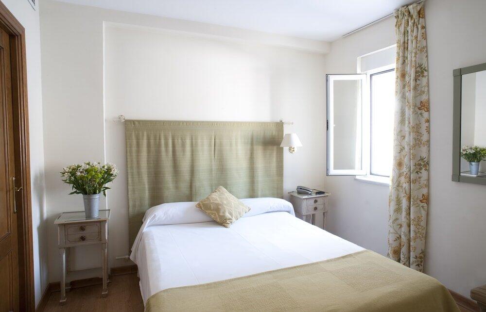 Foto de una habitación de Hotel Alcántara