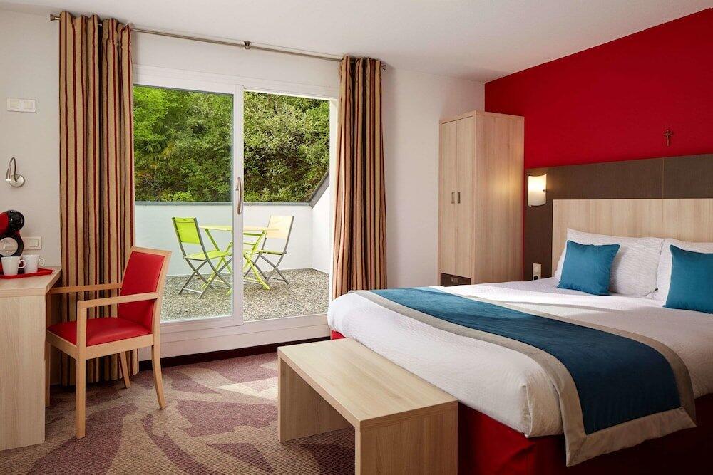 Foto de una habitación de Hôtel Roissy
