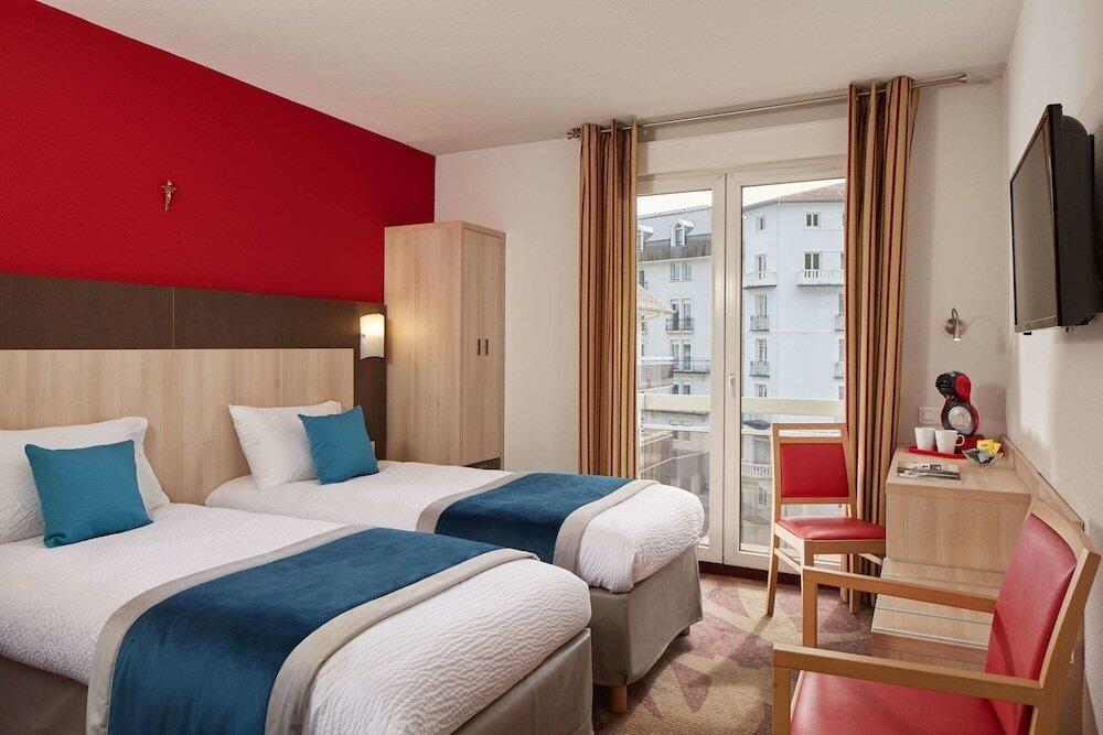 Foto de una habitación de Hôtel Roissy