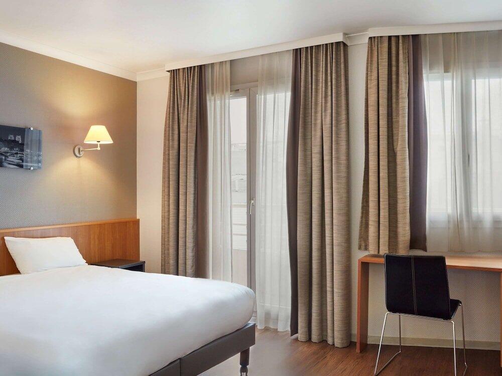 Foto de una habitación de Aparthotel Adagio La Défense Le Parc