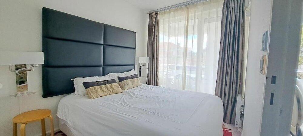 Foto de una habitación de Appart-Hôtel Le Trianon