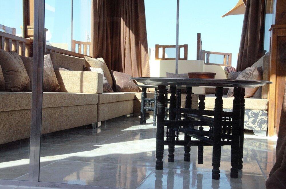 Foto de una habitación de Aparthotel Green Garden Resort
