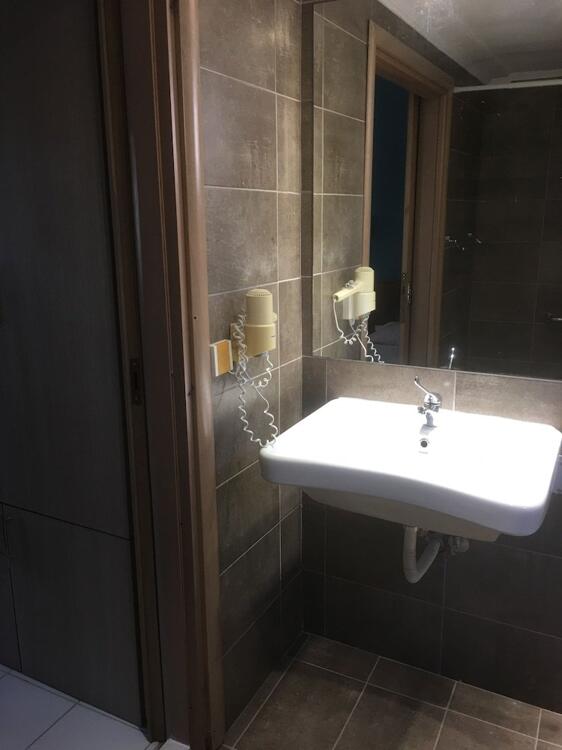 Foto del baño de Hermes Hotel