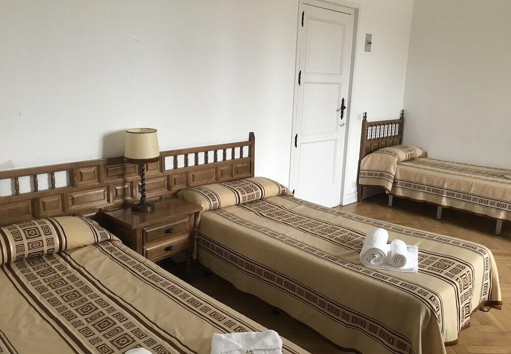 Foto de una habitación de Hospedería Santa Cruz