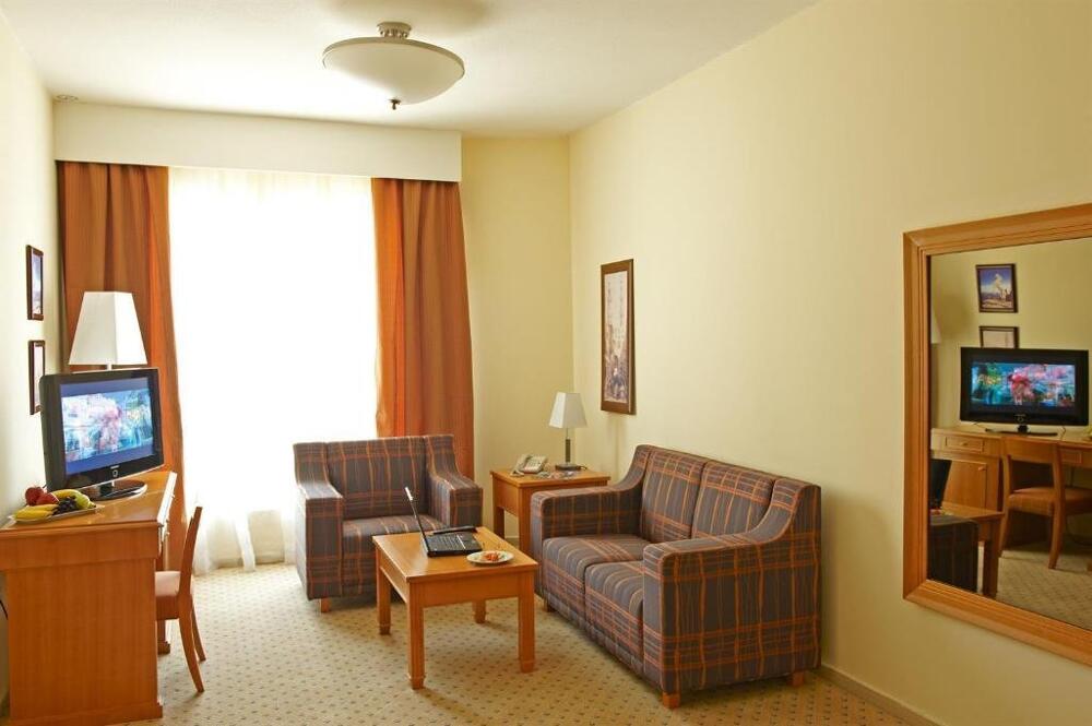 Foto de una habitación de Hotel Golden Tulip Sharjah
