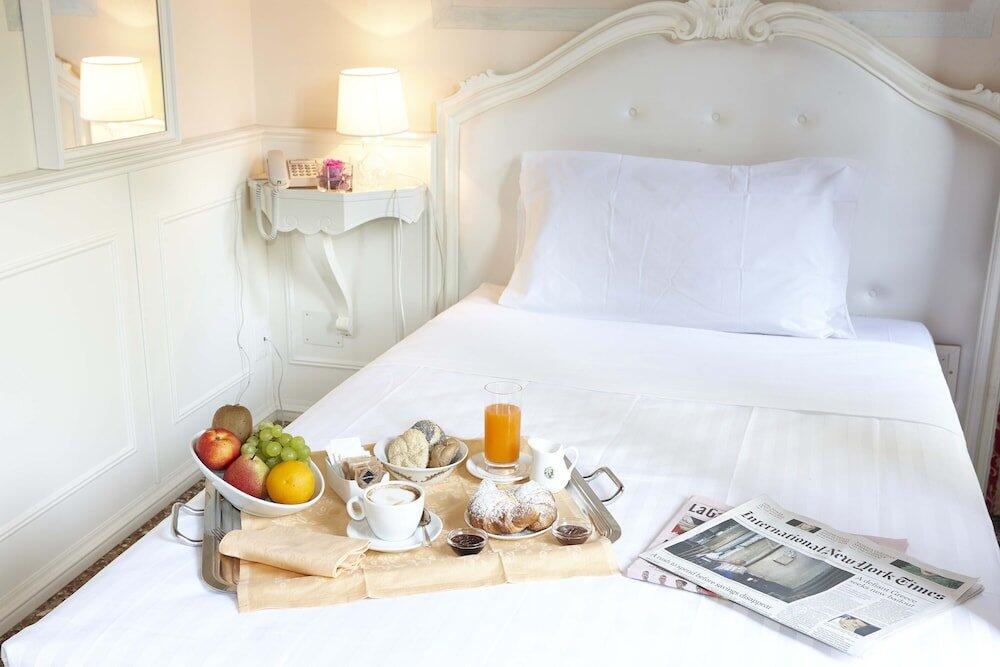 Foto de una habitación de Hotel Villa Patriarca