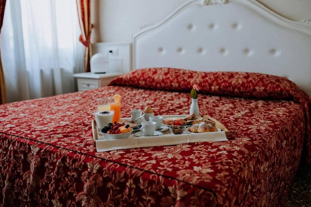 Foto de una habitación de Hotel Villa Patriarca