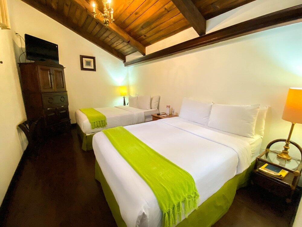 Foto de una habitación de El Carmen Hotel