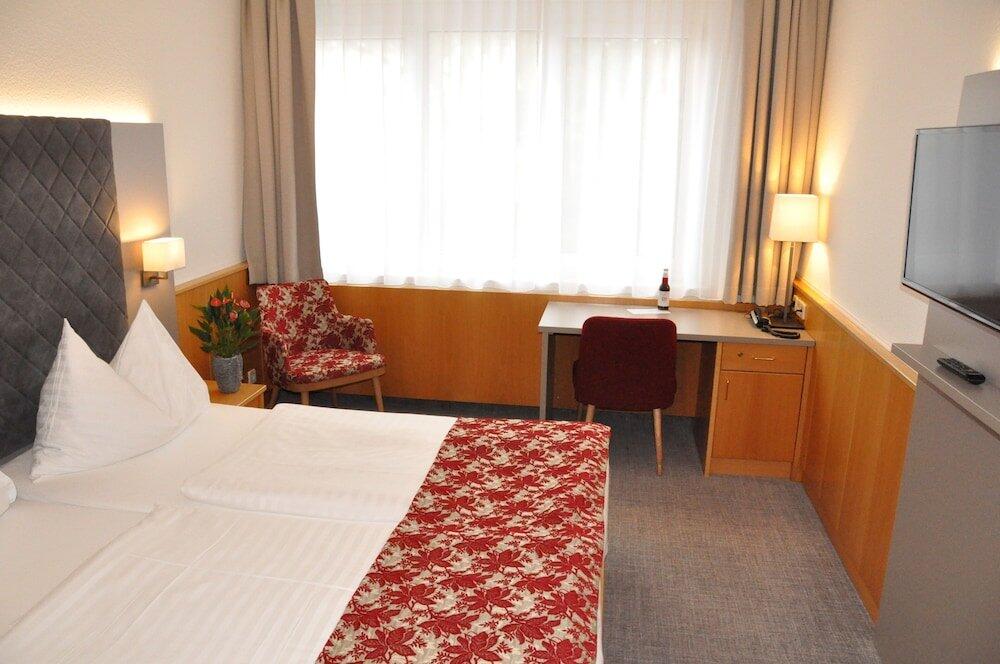 Foto de una habitación de Stadtoase Kolping Hotel