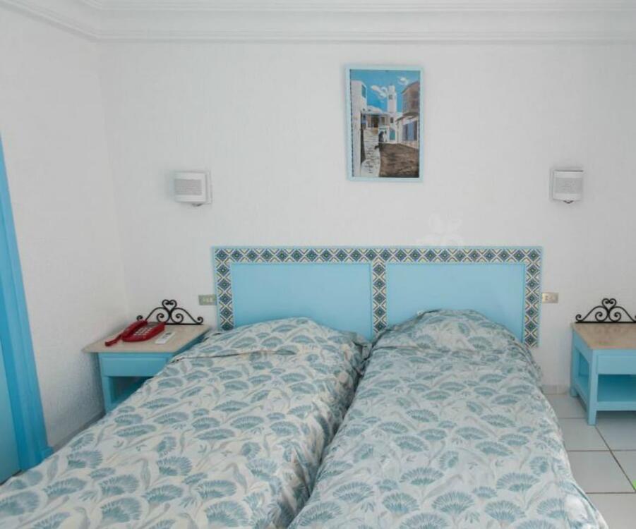 Foto de una habitación de Hotel Les Pyramides