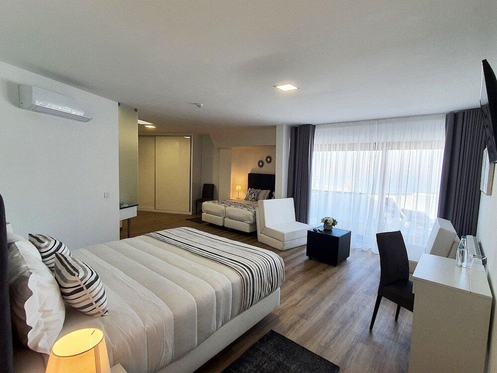 Foto de una habitación de Miramar Hotel Spa &amp;amp; Apartments