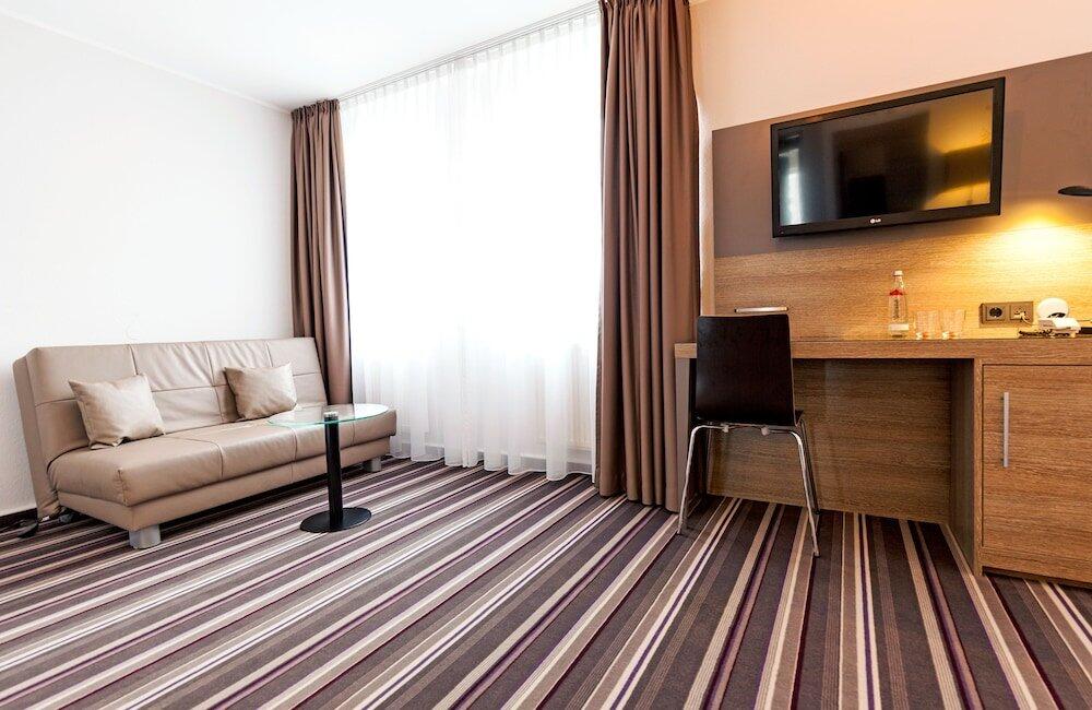 Foto de una habitación de Leonardo Hotel Nürnberg