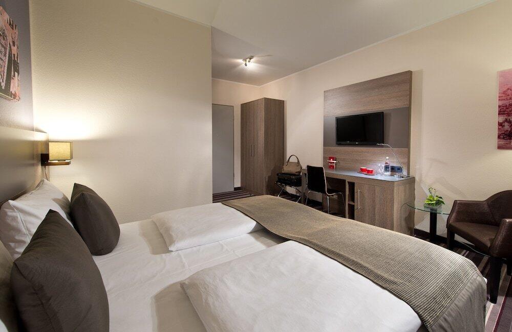 Foto de una habitación de Leonardo Hotel Nürnberg