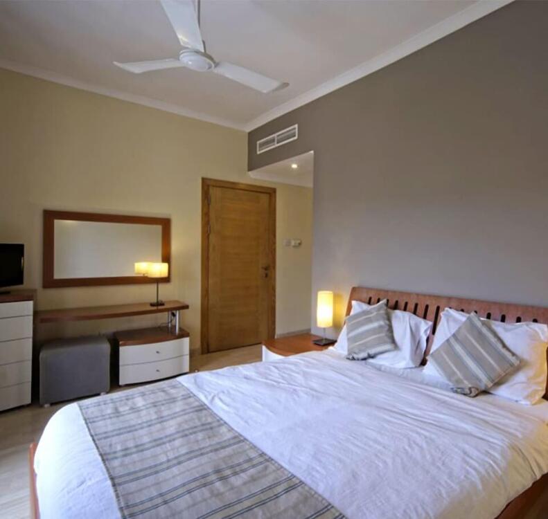 Foto de una habitación de Porto Azzurro Aparthotel