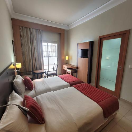 Foto de una habitación de Hôtel Tiba